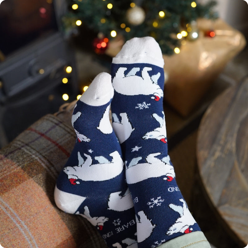 Model wearing Bare Kind blue polar bear bamboo socks