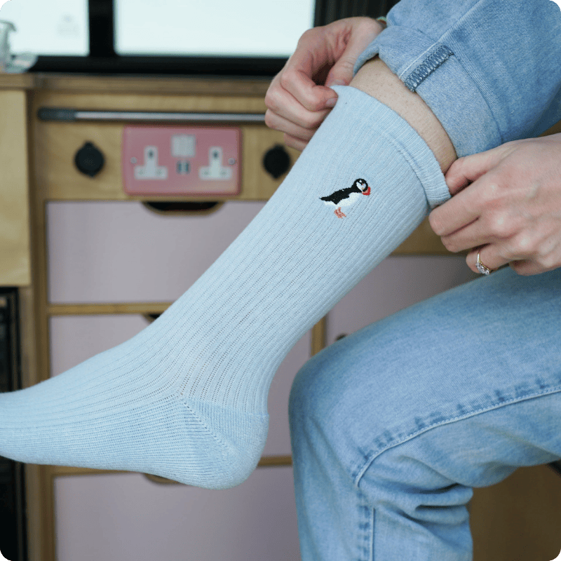 Model wearing Puffin socks 