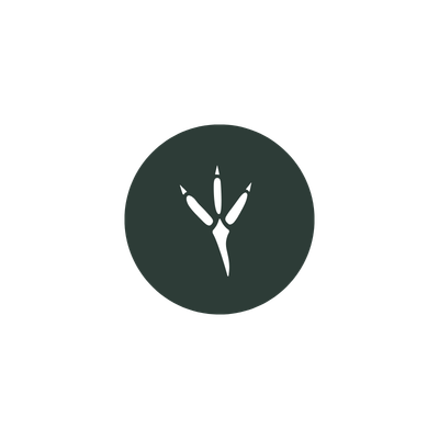 Dark green circle with a white bird footprint icon on a white background