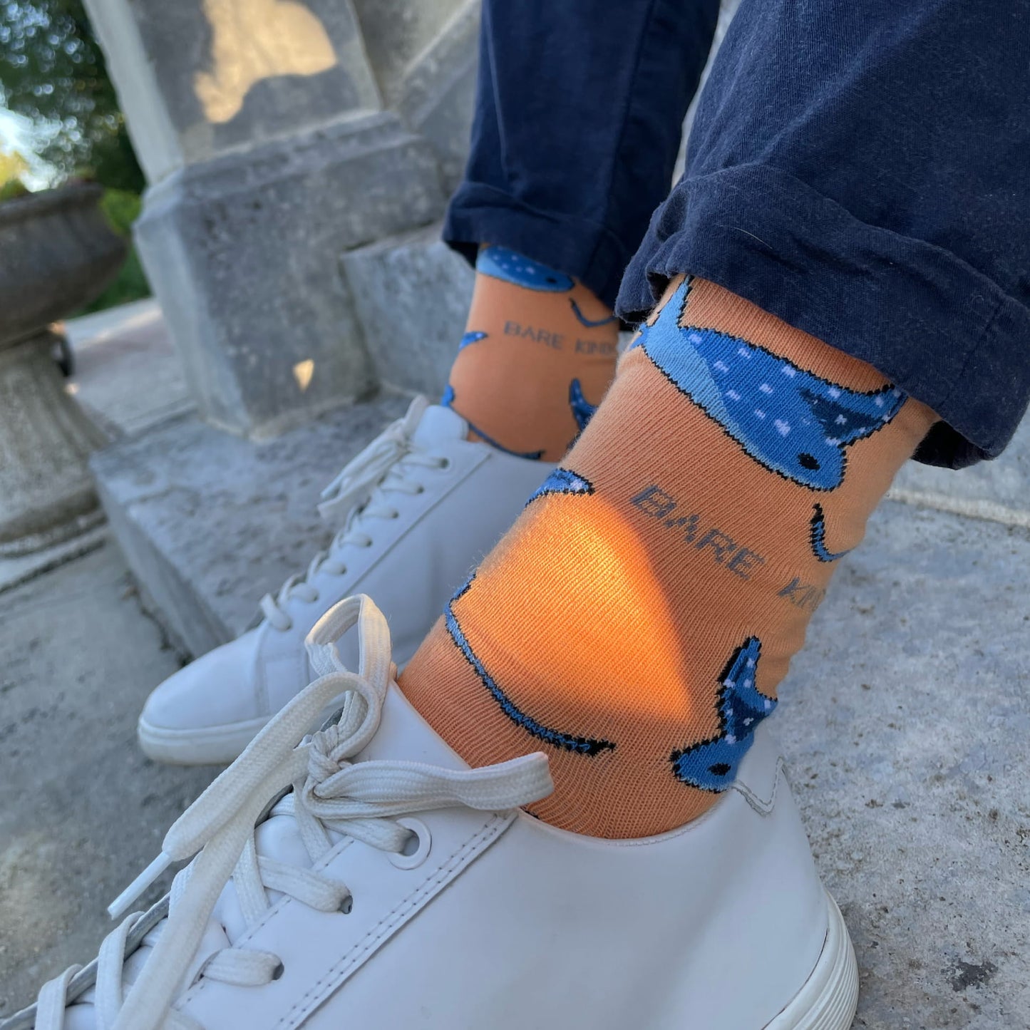 model wearing orange ray bamboo socks