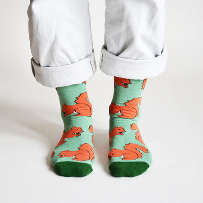 model wearing red squirrel bamboo socks