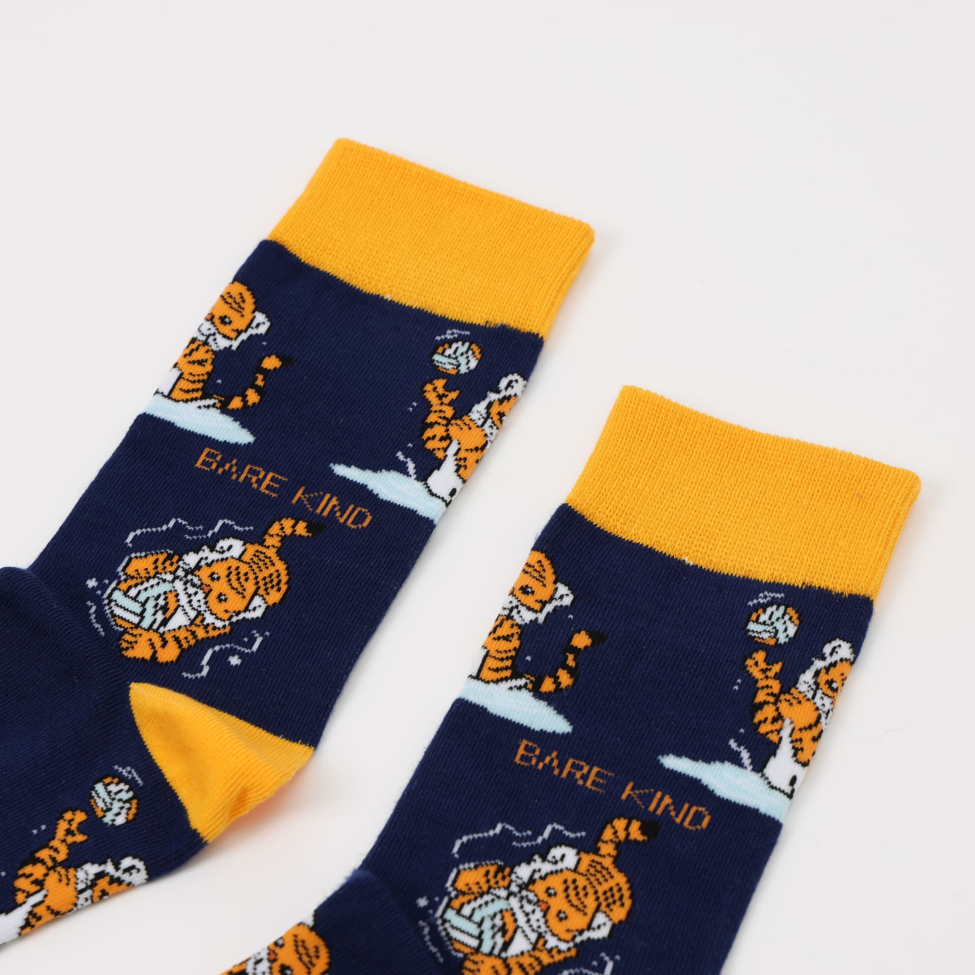 closeup to blue yellow sport tiger bamboo socks