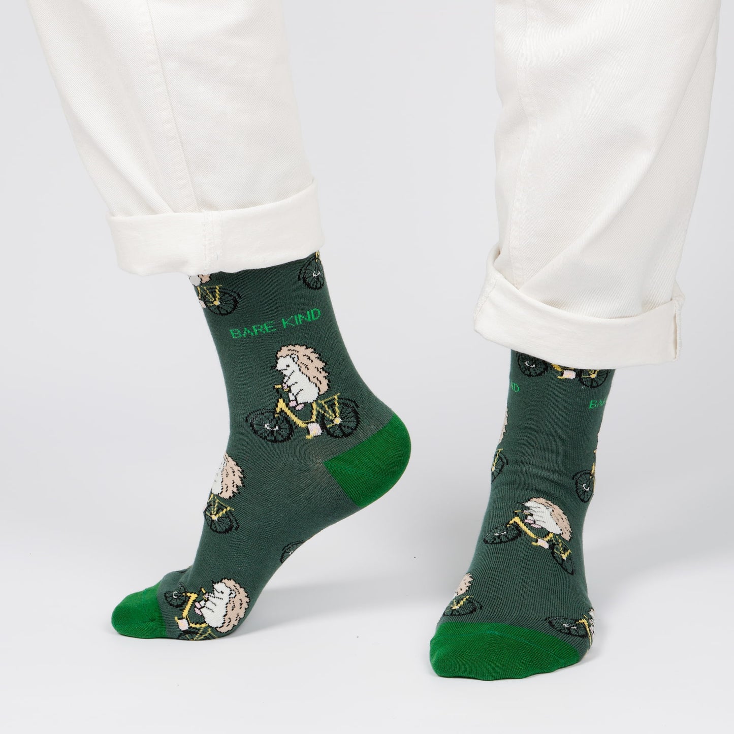 model wearing green sport hedgehog bamboo socks