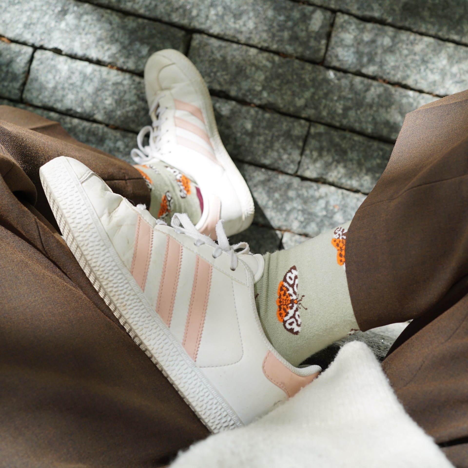 model wearing grey orange tiger moth bamboo socks