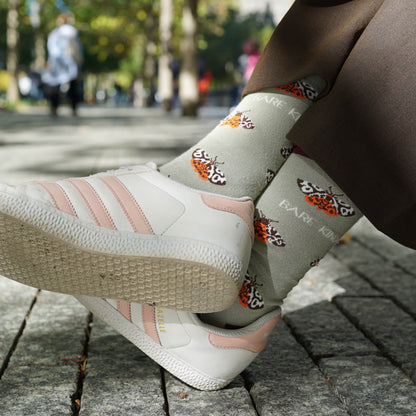 model wearing grey orange tiger moth bamboo socks