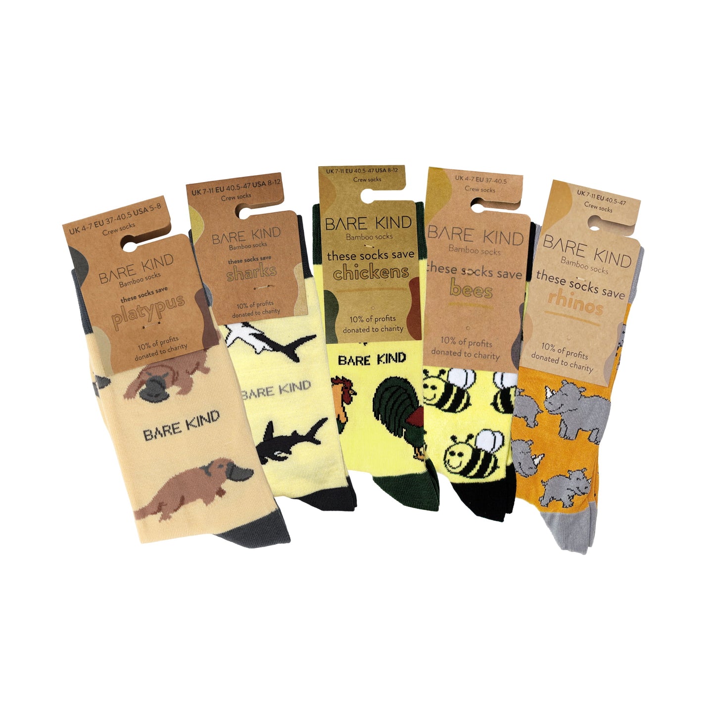 packaging flat lays of yellow platypus, shark, chicken, bee and rhino bamboo socks