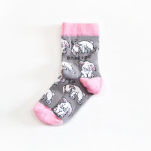 single flat lay of grey and pink rabbit bamboo socks for kids 