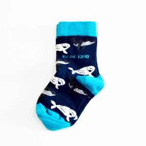 single flat lay of blue bamboo whale socks for kids