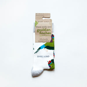 folded flat lay of white gouldian finch bamboo socks in 100% recyclable cardboard packaging