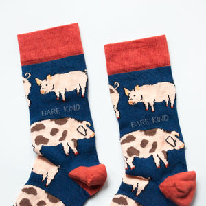 cuff closeup flat lay of navy blue pig bamboo socks