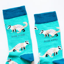 cuff closeup flat lay of bright blue numbat socks