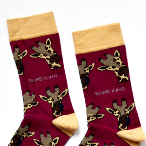 cuff closeup flat lay of burgundy bamboo socks in giraffe print