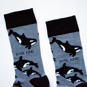 cuff closeup flat lay of black and grey orca bamboo socks