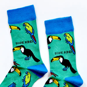 cuff closeup flat lay of green and blue toucan bamboo socks