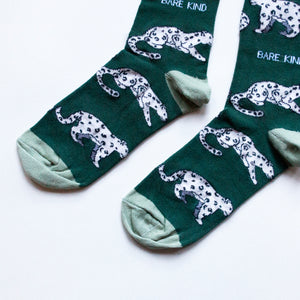 toe closeup flat lay of green snow leopard bamboo socks