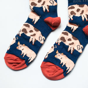 toe closeup flat lay of navy blue pig bamboo socks