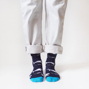 standing model, front view, wearing bamboo whale socks