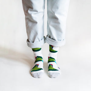 standing model wearing white gouldian finch bamboo socks, front view