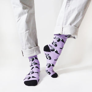 standing model with left heel up wearing lilac and black panda bamboo socks