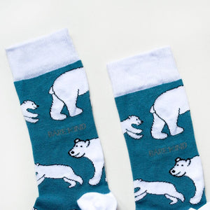 cuff closeup flat lay of blue and white polar bear socks